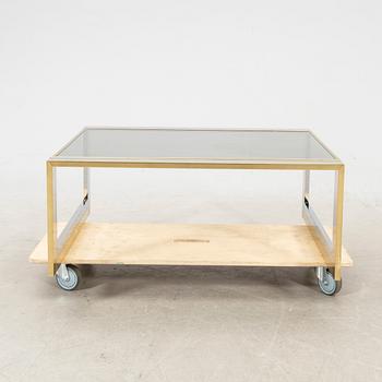 A glass and metal coffee table from Romeo Rega second half of the 20th century.