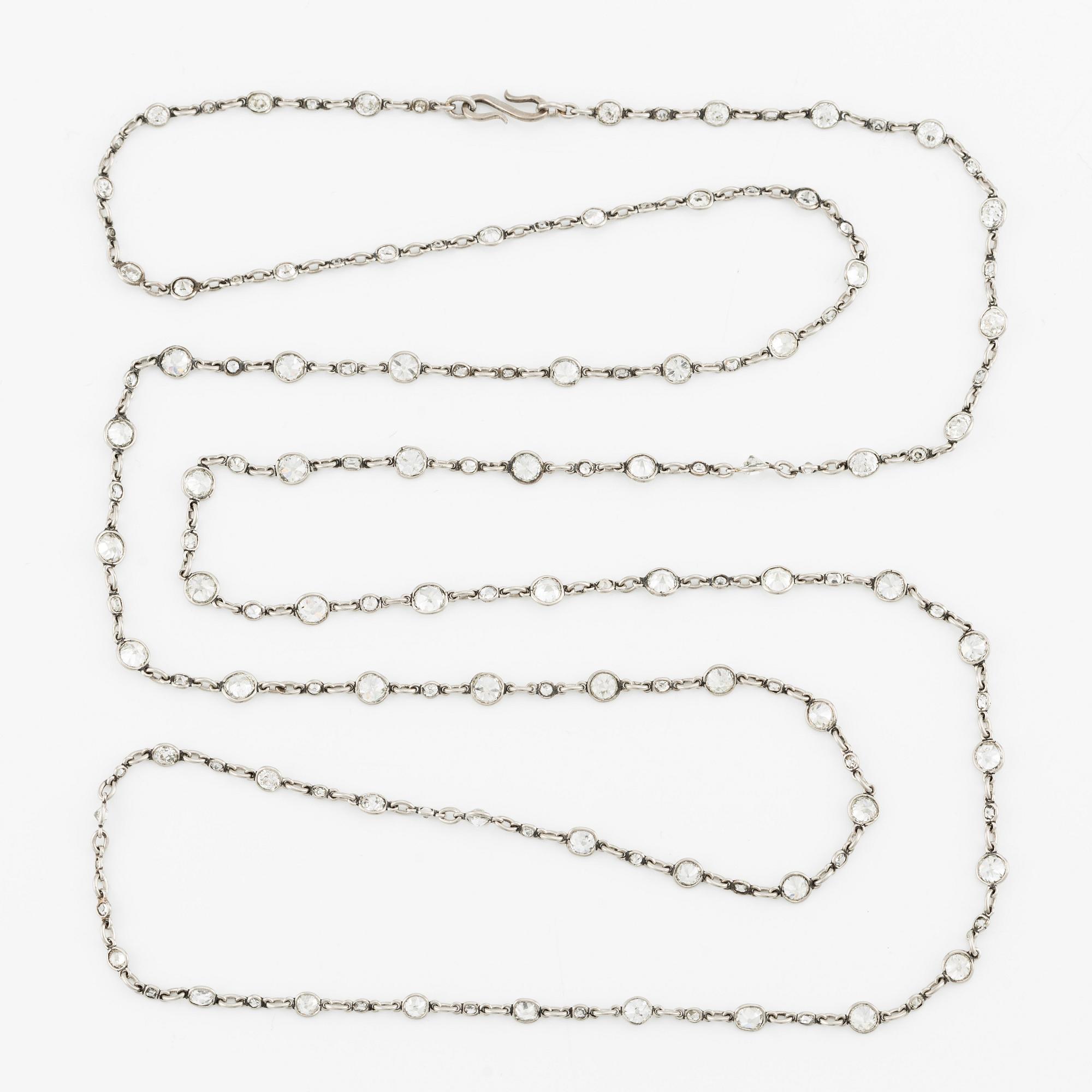 An antique platinum diamond long chain.