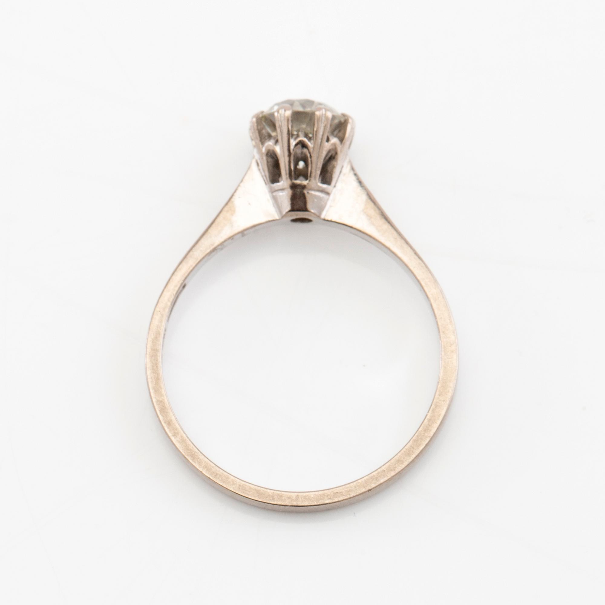 Solitaire ring in 18K white gold with a Very Faint Light Green diamond approximately 1.10 ct.