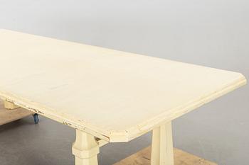 A mdi 1900's painted dining table.