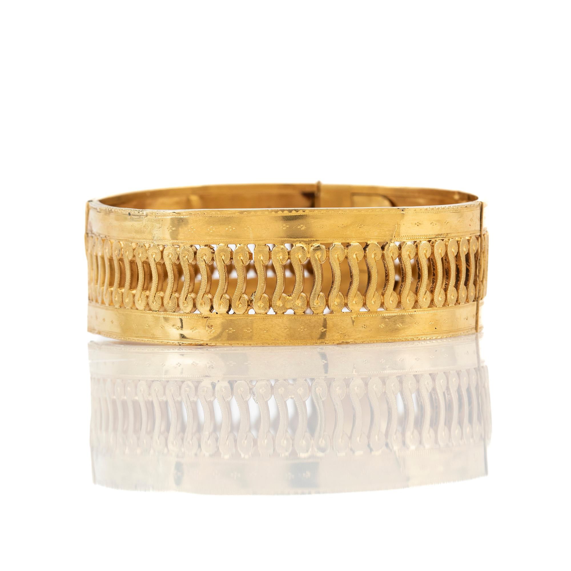 Arm ring, 18k gold.