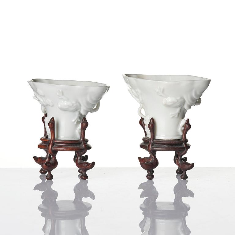 Two blanc de chine rhinoceros libation cups, Qing dynasty, Kangxi (1662-1722).