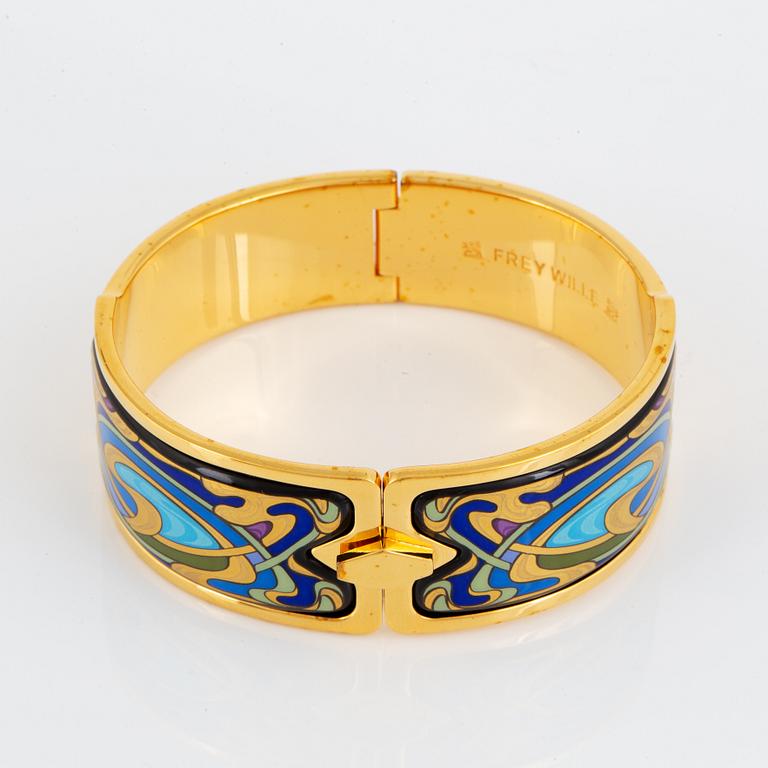 FREY WILLE, an enamel and gold plated metal bangle.