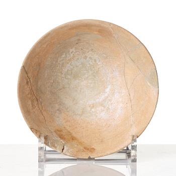 A Persian pottery bowl  13th century.