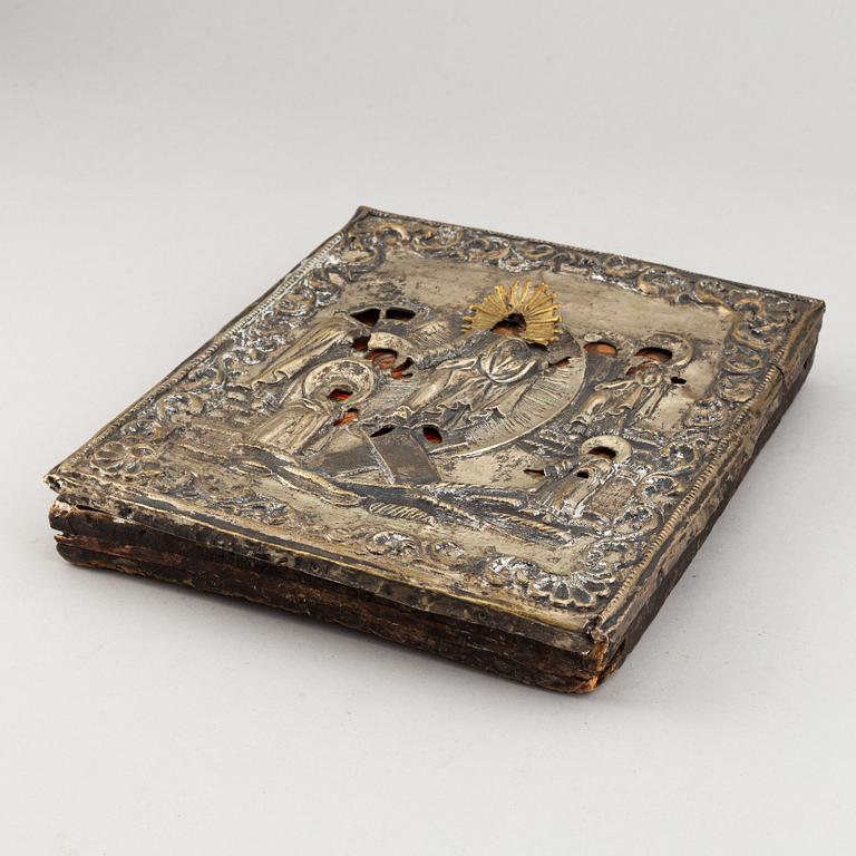 A russian icon with ochlad, rempera on panel, 19th Century.