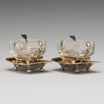 A pair of Swedish 19th century parcel-gilt silver and glass jelly-bowls, mark of Carl Tengstedt, Gothenburg 1839.