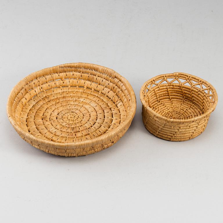 Two Sami root baskets, one signed.