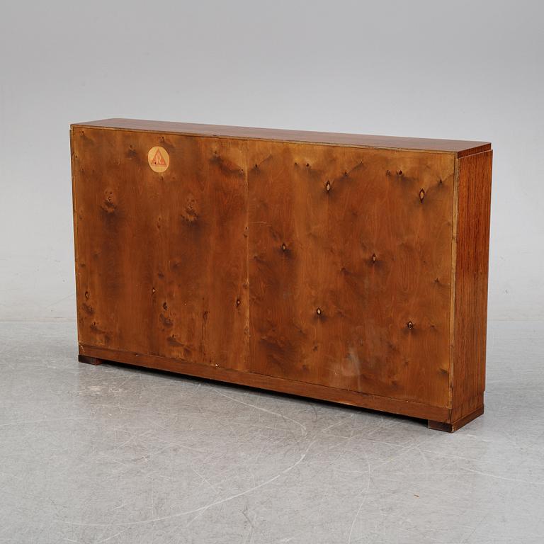 A mahogany veneered book shelf, Reiners Möbler, Mjölby, 1930's/40's.