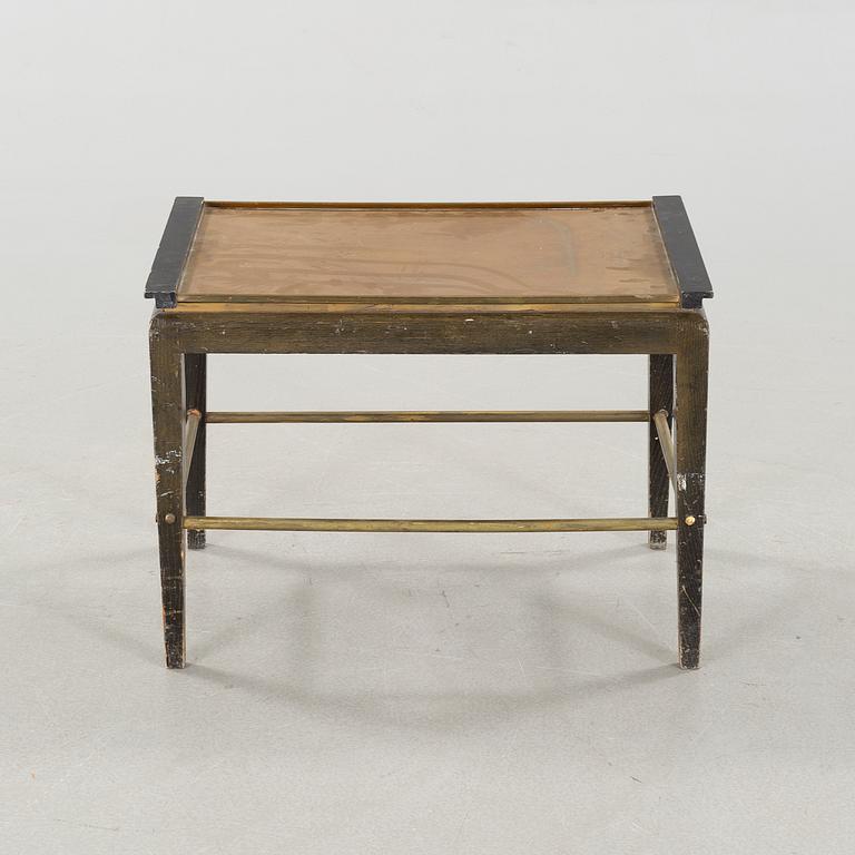 A tray table from the first half of the 20th century by Ystad Brons.