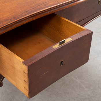 A mahogany Rococo revival desk, late 19th Century.