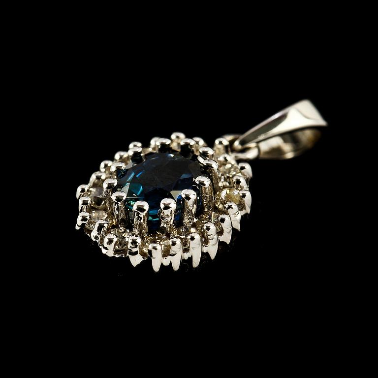 HÄNGE, 18k vitguld, fasettslipad blå safir samt små briljantslipade diamanter. Vikt 2 g.