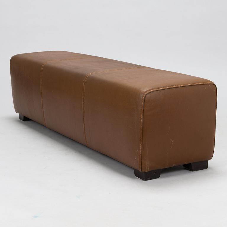 A leather-upholstered bench from Industria Divani e Poltrone, Italy.