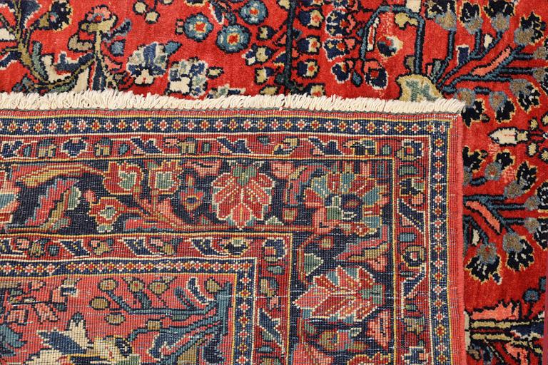 An American Sarouk rug, semi-antique, c. 200 x 142 cm.