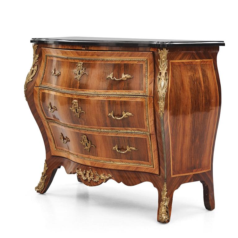 A rococo parquetry and gilt brass-mounted commode possibly by C. Åhman (master in Stockholm 1748-1783).