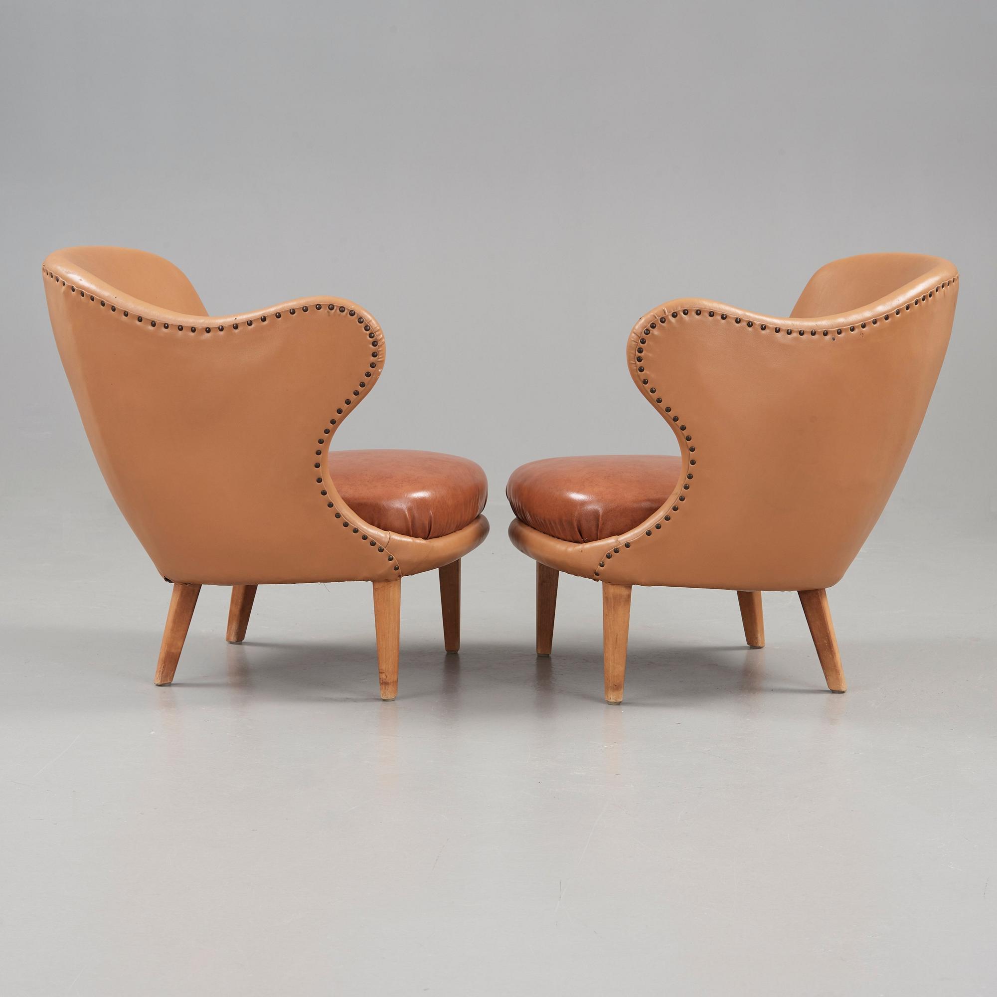Arne Norell, A pair of Arne Norell 'Tummen/ The Thumb' easy chairs, Gösta Westerbergs Möbler, Stockholm 1950's.