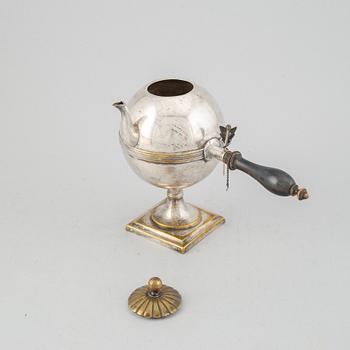 An Empire 19th century silvered brass teapot.