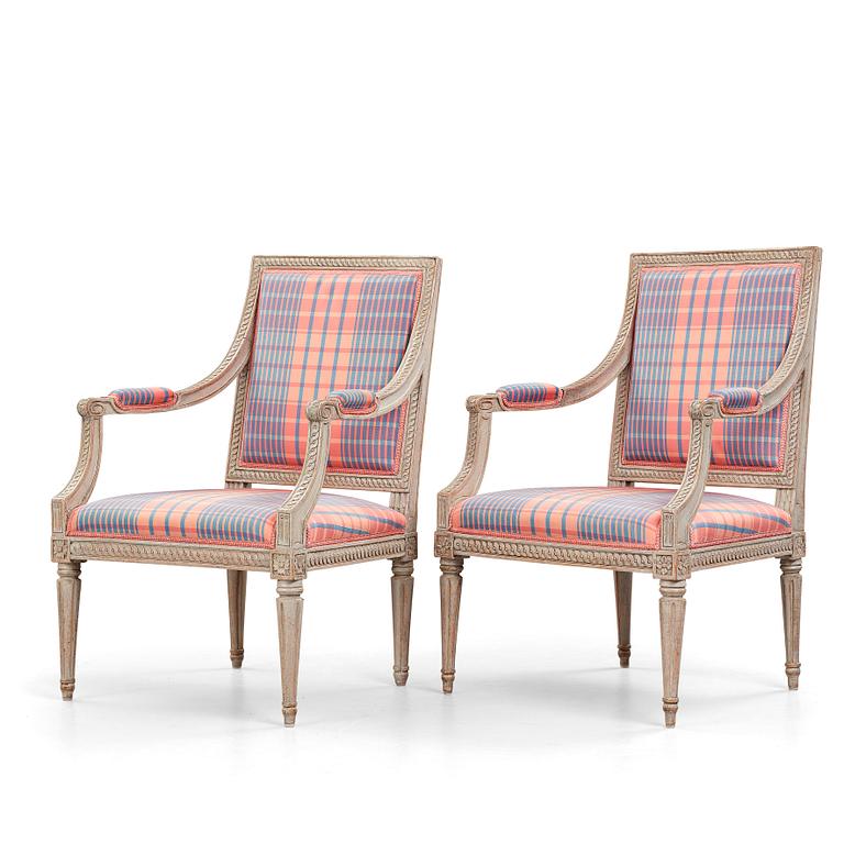 Two matched Gustavian armchairs, by Jakob Malmsten (master in Stockholm 1780-88).