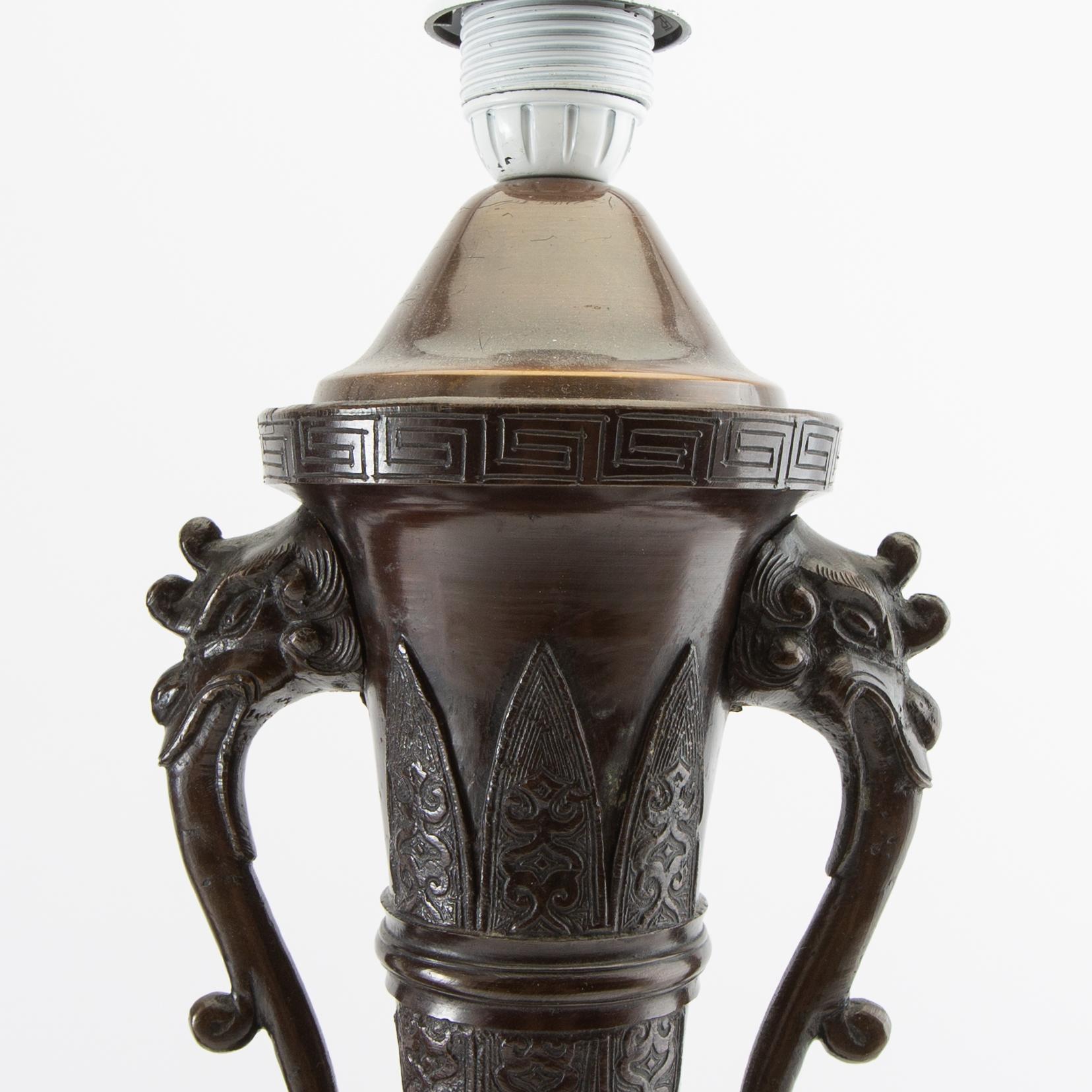 Table lamps a pair China 20th century patinated metal.