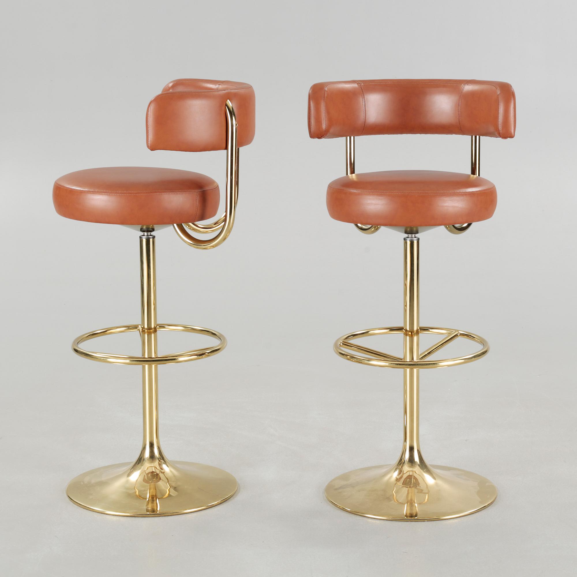 Two bar stools and a bar table by Börje Johanson, model "Jupiter", for Johanson design, second half of the 20th century.