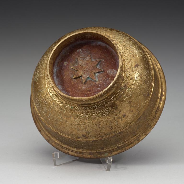 A Tibetan bronze bowl, 19th Century.