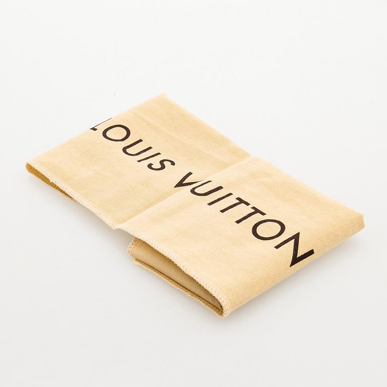 Louis Vuitton, a 'Selenga' clutch bag.