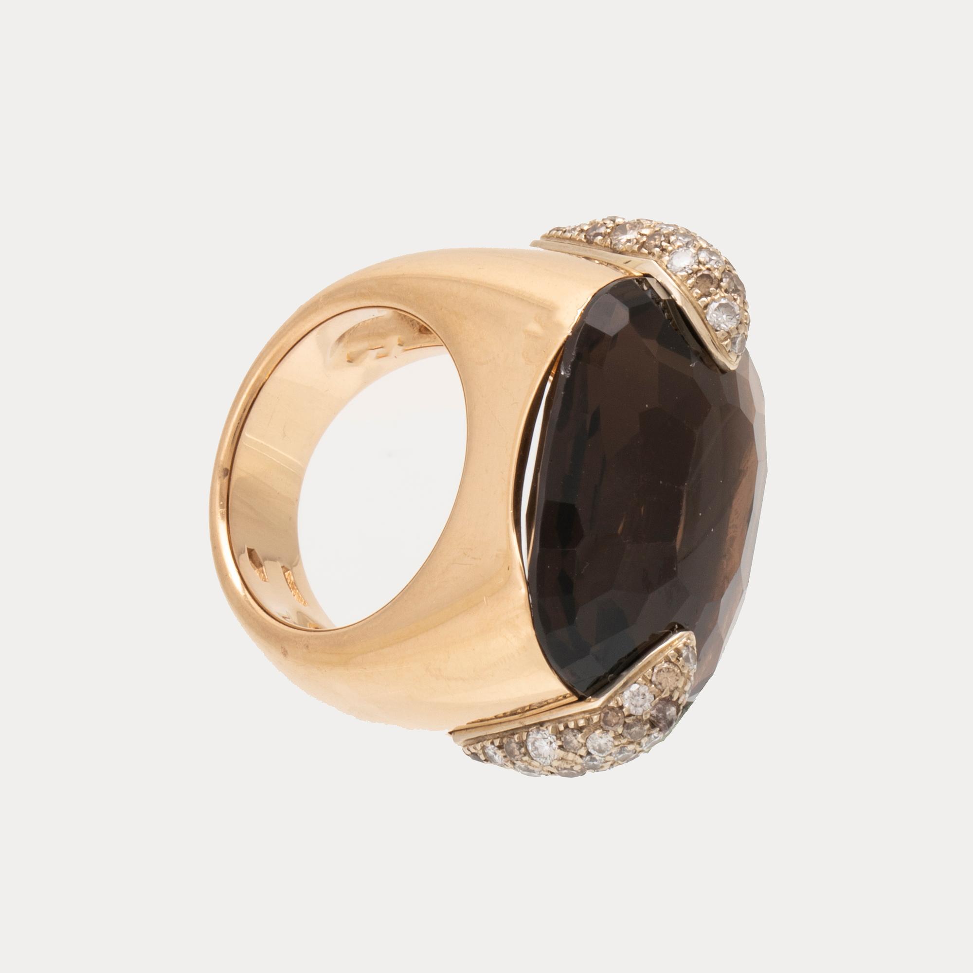 An 18K gold Pomellato "Pin Up" ring set with smoky quartz and round brilliant-cut diamonds.