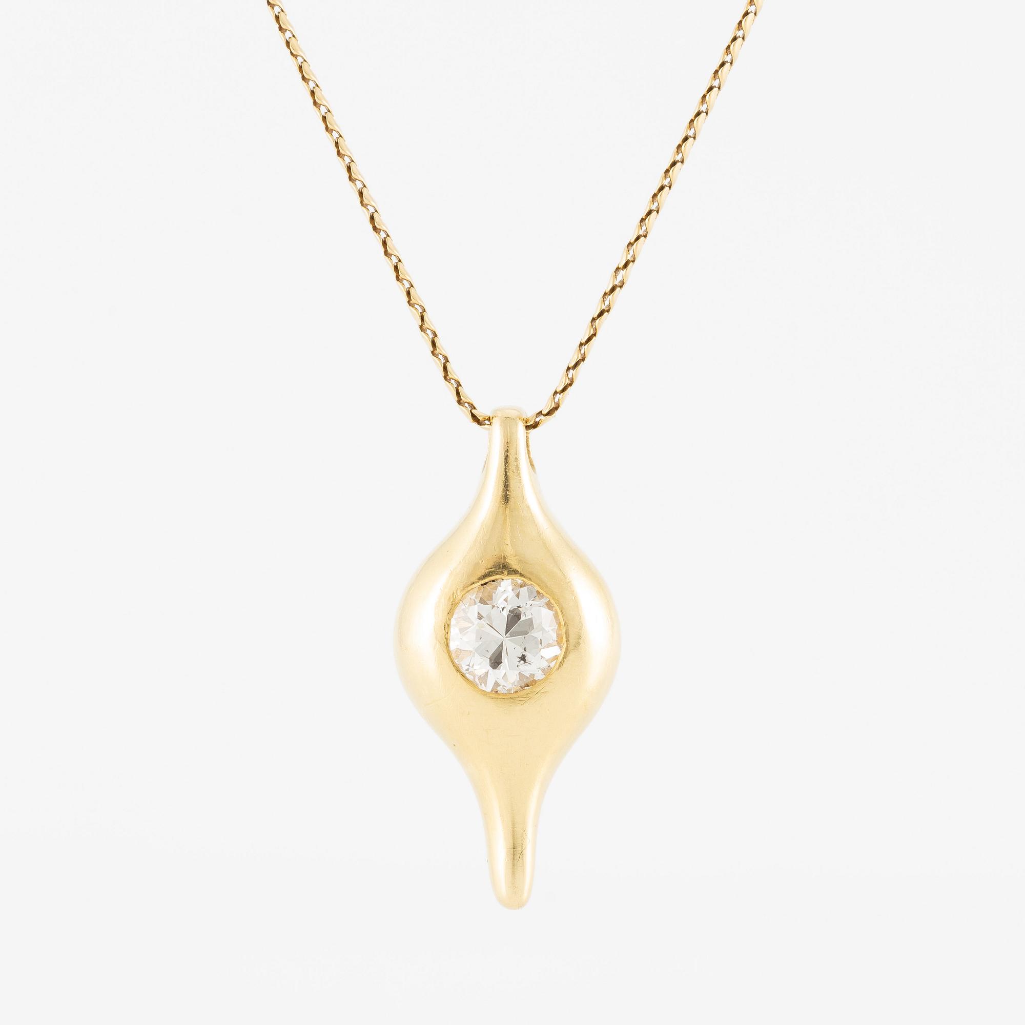 Pendant in 18K gold with a round brilliant-cut diamond.