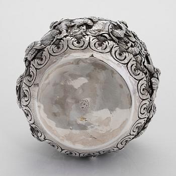 A silver bowl, Tillander import marks, 1983, and a silver snuff bottle.