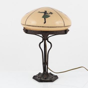 An iron table lamp, early 20th Century.