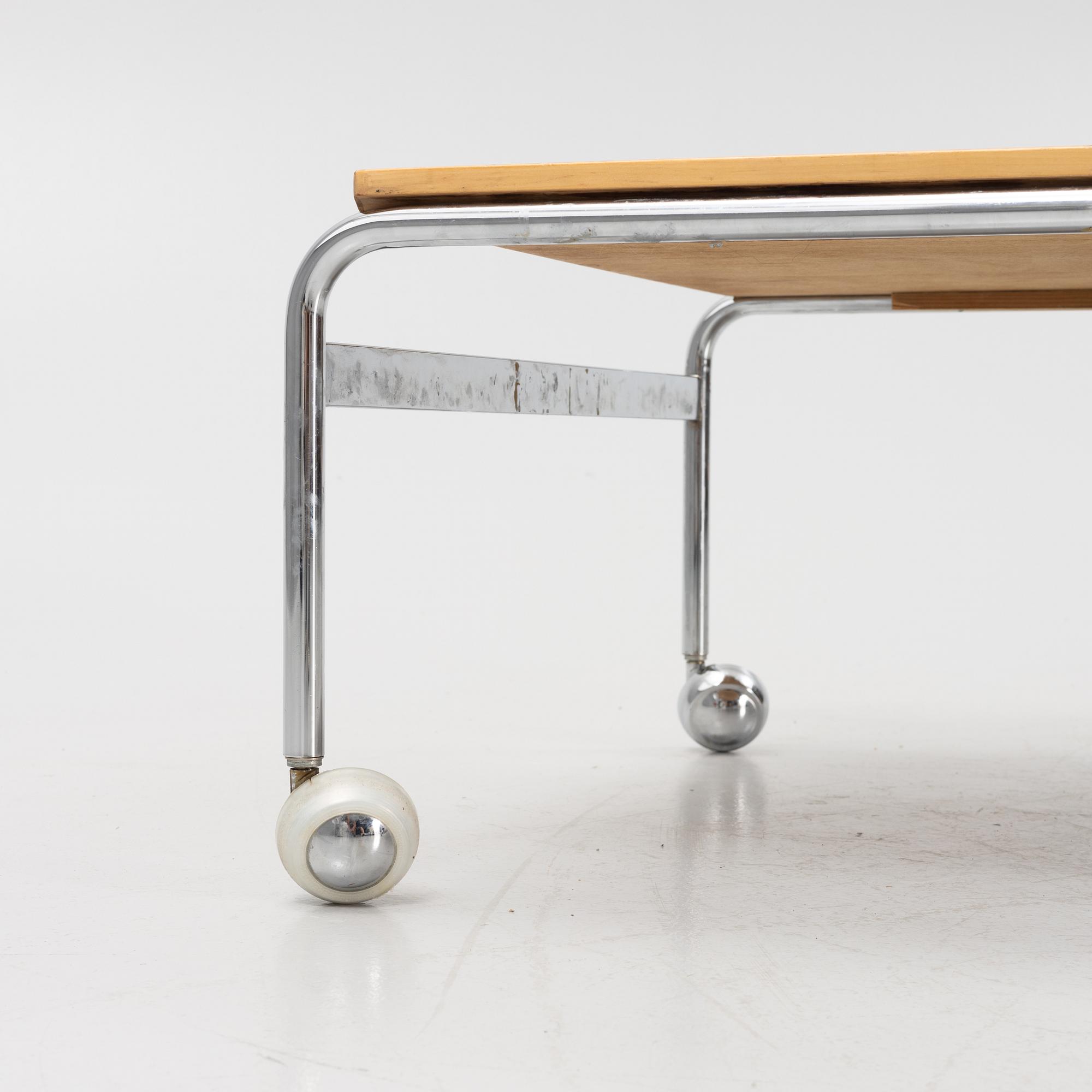 Bruno Mathsson, a birch and chrome 'Karin' coffee table.