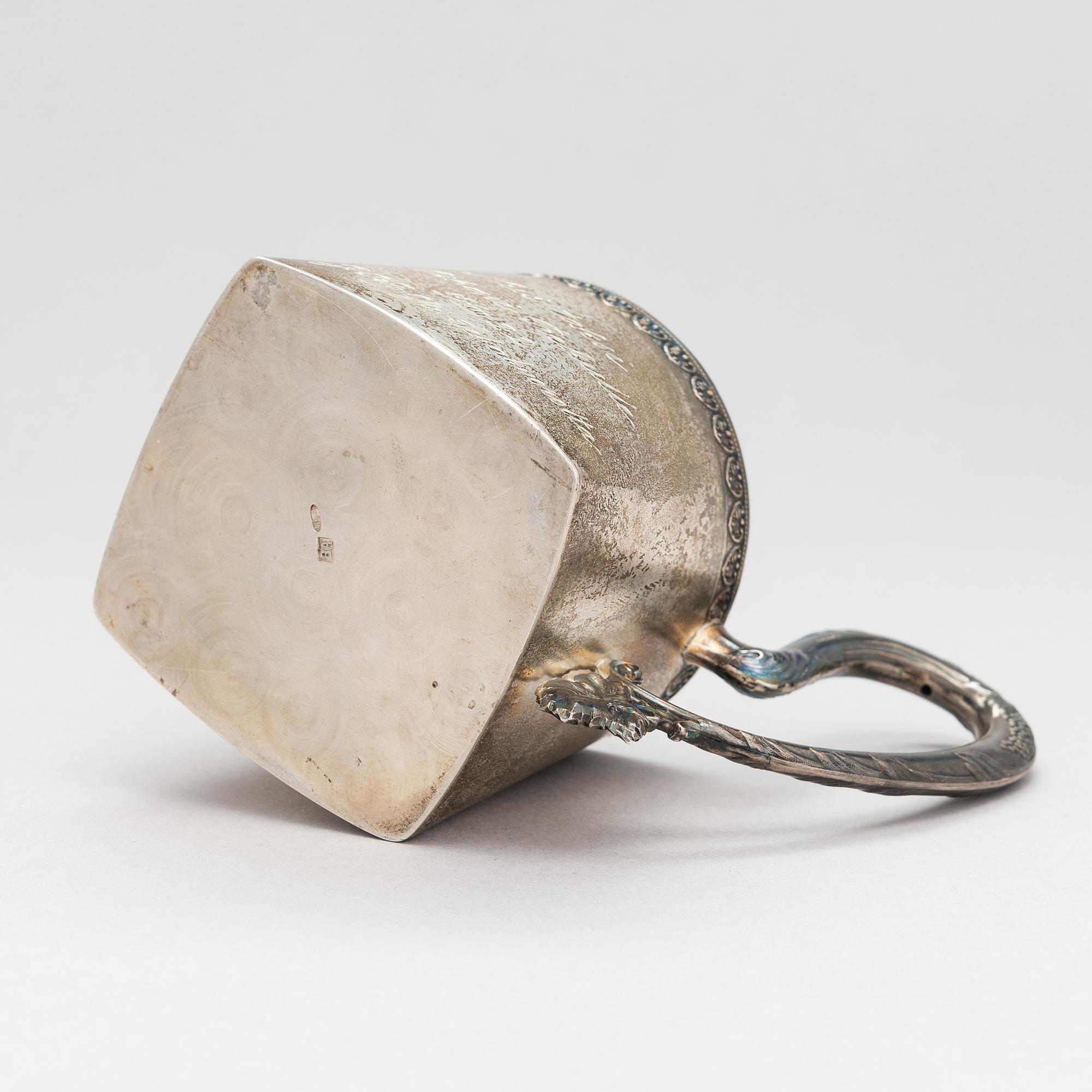 A parcel-gilt silver tea-glass holder, mark possibly of Vasily Andreyev, Moscow 1908-17.