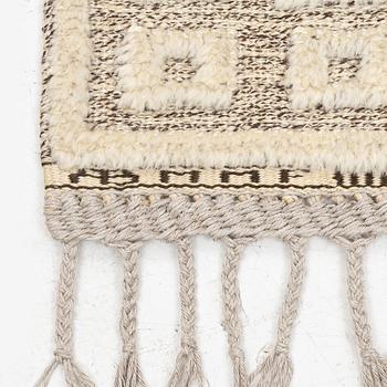 Märta Måås-Fjetterström, a 'Vita spetsporten' carpet, knotted pile in relief, c. 225 x 136 cm. signed AB MMF.