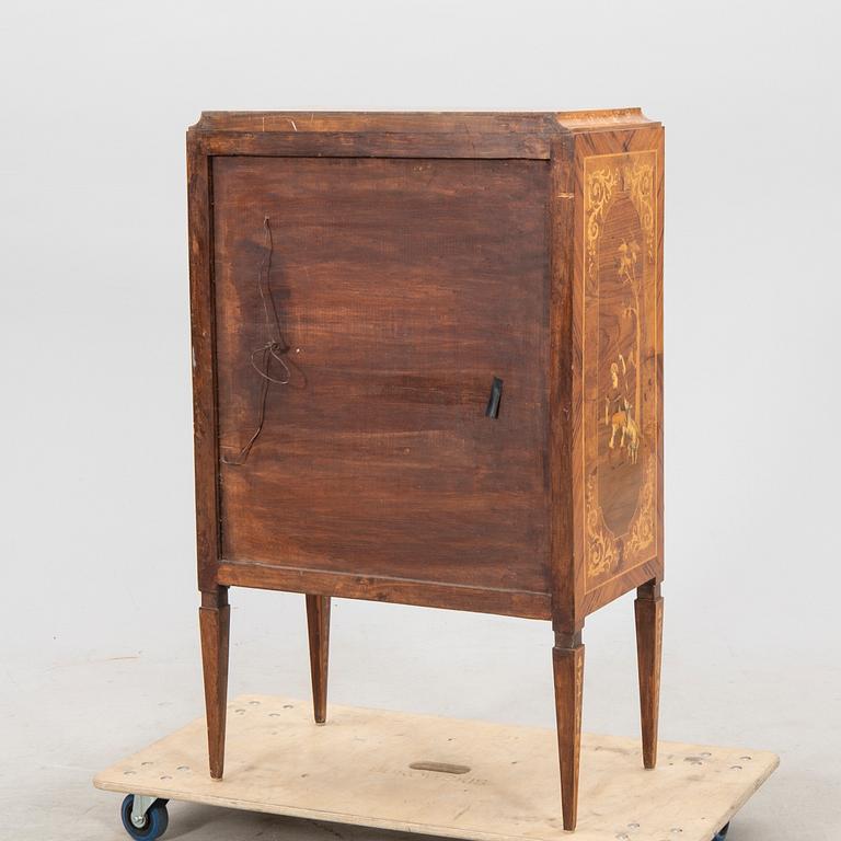 A mid 1900s European bar cabinet.