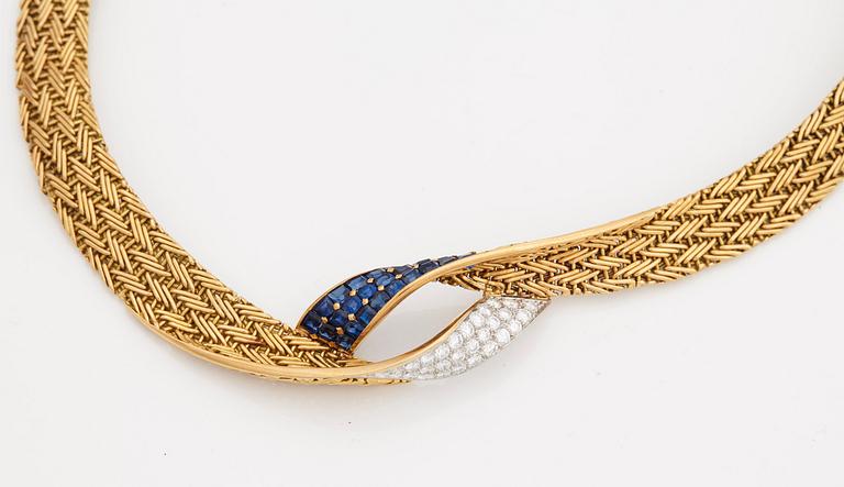 A necklace set with round- brilliant cut diamonds and step cut sapphires.