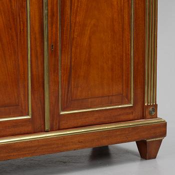 A pair of Russian mahogany and brass-mounted Jacob-style bibliothèques, modern with old parts.