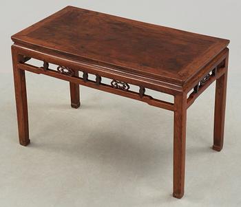 A hardwood free standing table, Qing dynasty (1662-1912).