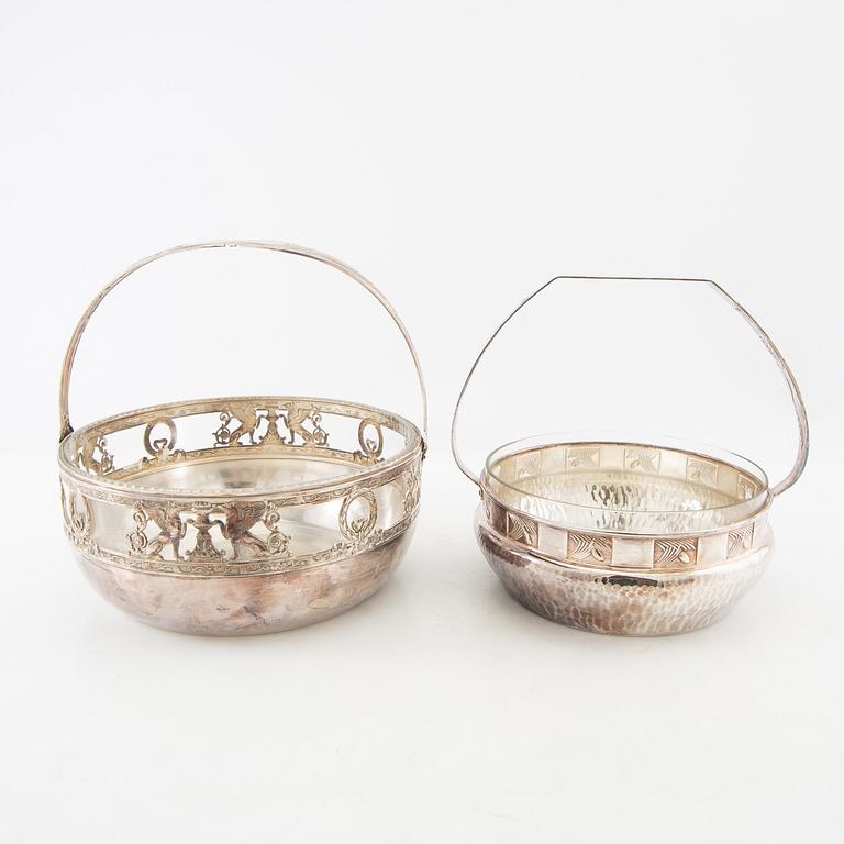 Two henkelskålar in silver-plated metal from the early 20th century, one marked Wurtembergische Metalwarenfabrik, Art Nouveau.