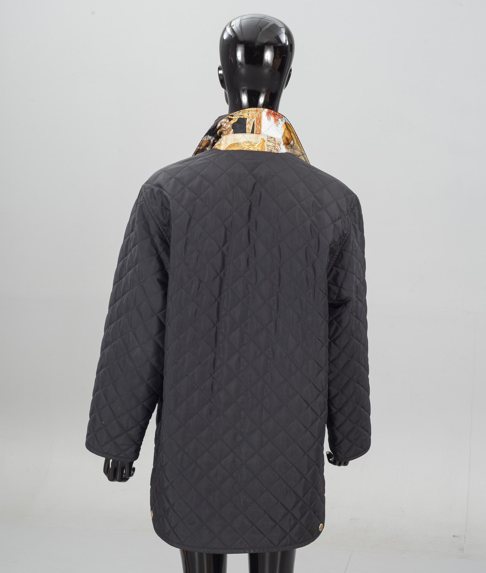 JACKA samt BLUS. Salvatore Ferragamo.