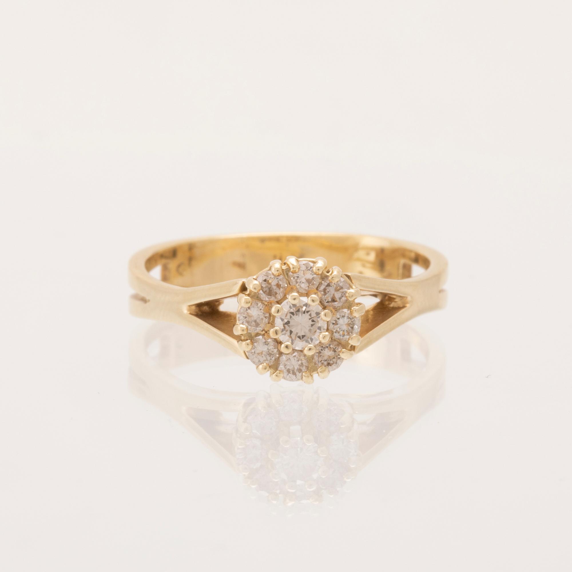 An 18K yellow gold Carmosé ring set with round brilliant-cut diamonds.