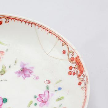 Set of three famille rose cups and saucers and a spare cup, 18th century.