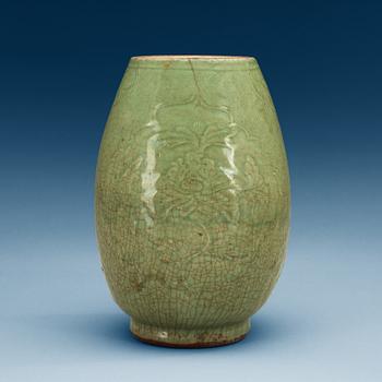 1244. A celadon glazed jar, Ming dynasty (1368-1644).