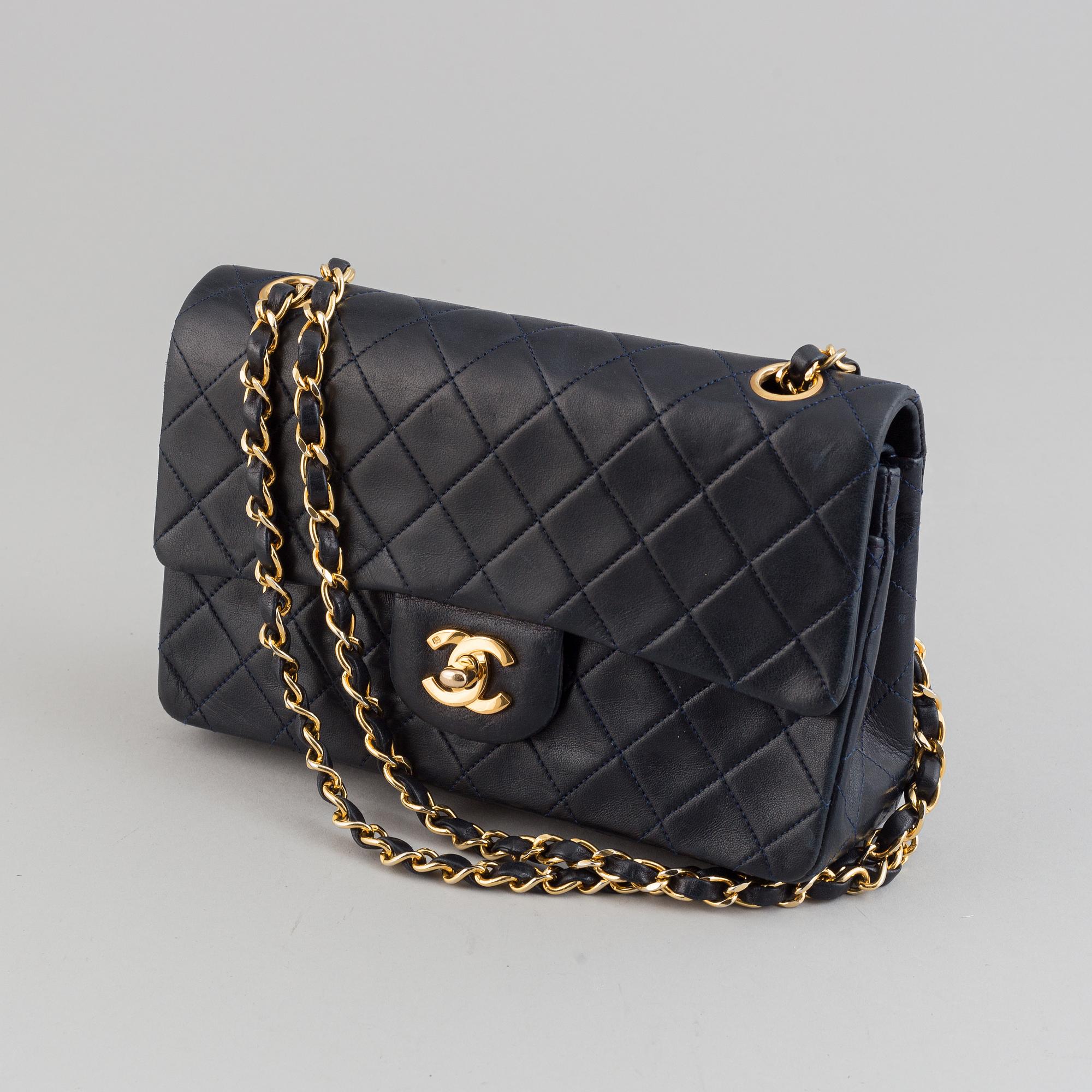 Chanel, a navy leather 'Double Flap Bag', 1989-91.