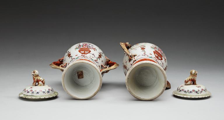 A pair of famille rose vases with covers, Qing dynasty, Qianlong (1736-95).