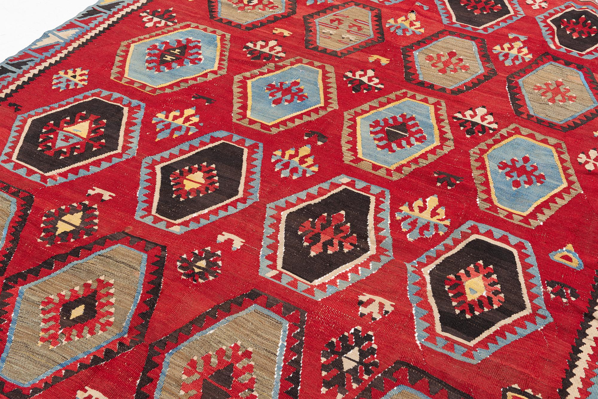 An antique/semi-attique kelim carpet, c. approx. 320 x 222 cm.