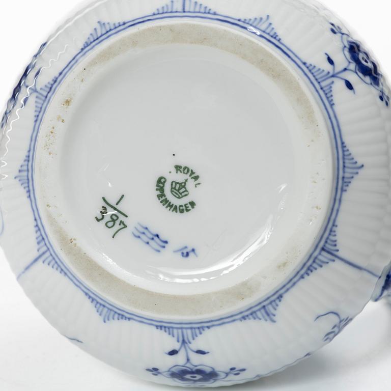 Royal Copenhagen, Three 'Musselmalet' jugs, circa 1900, and a Bing & Grøndahl cachepot, Denmark.