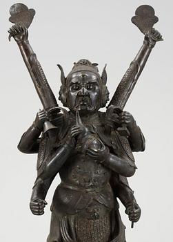 A massive Japanese bronze figure of a deity, 19th Century.