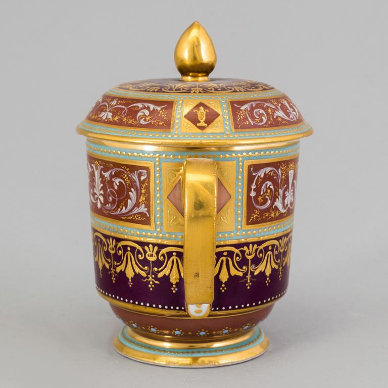 An early 19th century empire cup with saucer and cover with Wien mark.