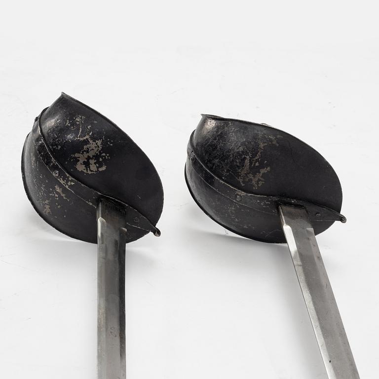A Swedish pair of military practice swords 1886 pattern.