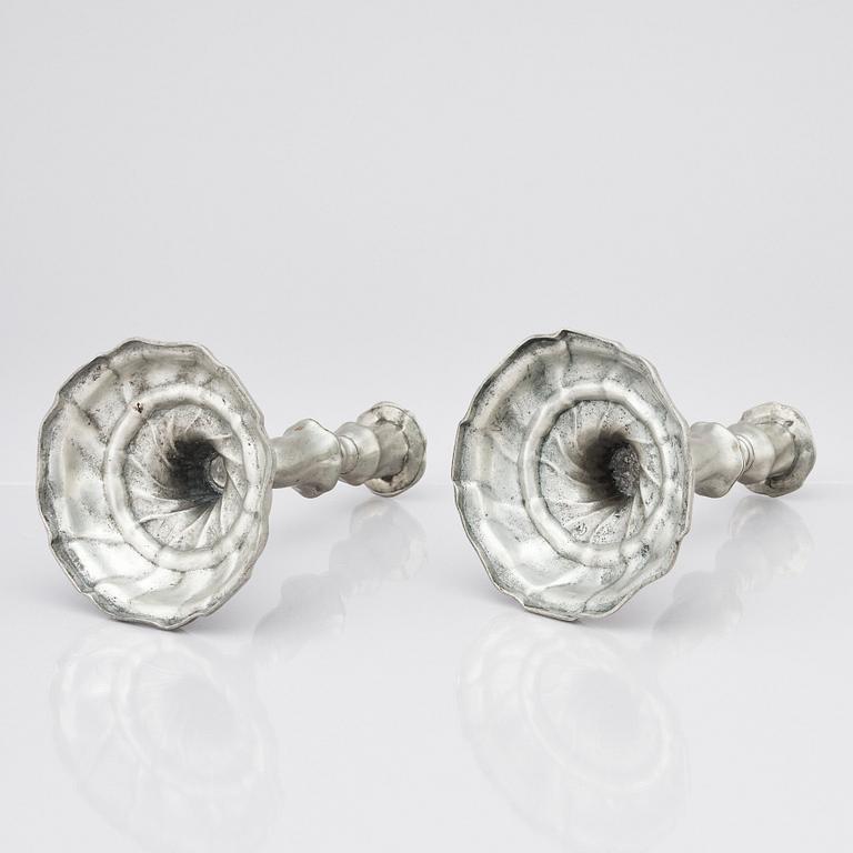 A pair of Rococo pewter candlesticks by C Sauer 1749.