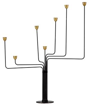 72. A Piet Hein black laquered metal and brass seven light candelabrum, 'Ursa Major', 1950's-60's.